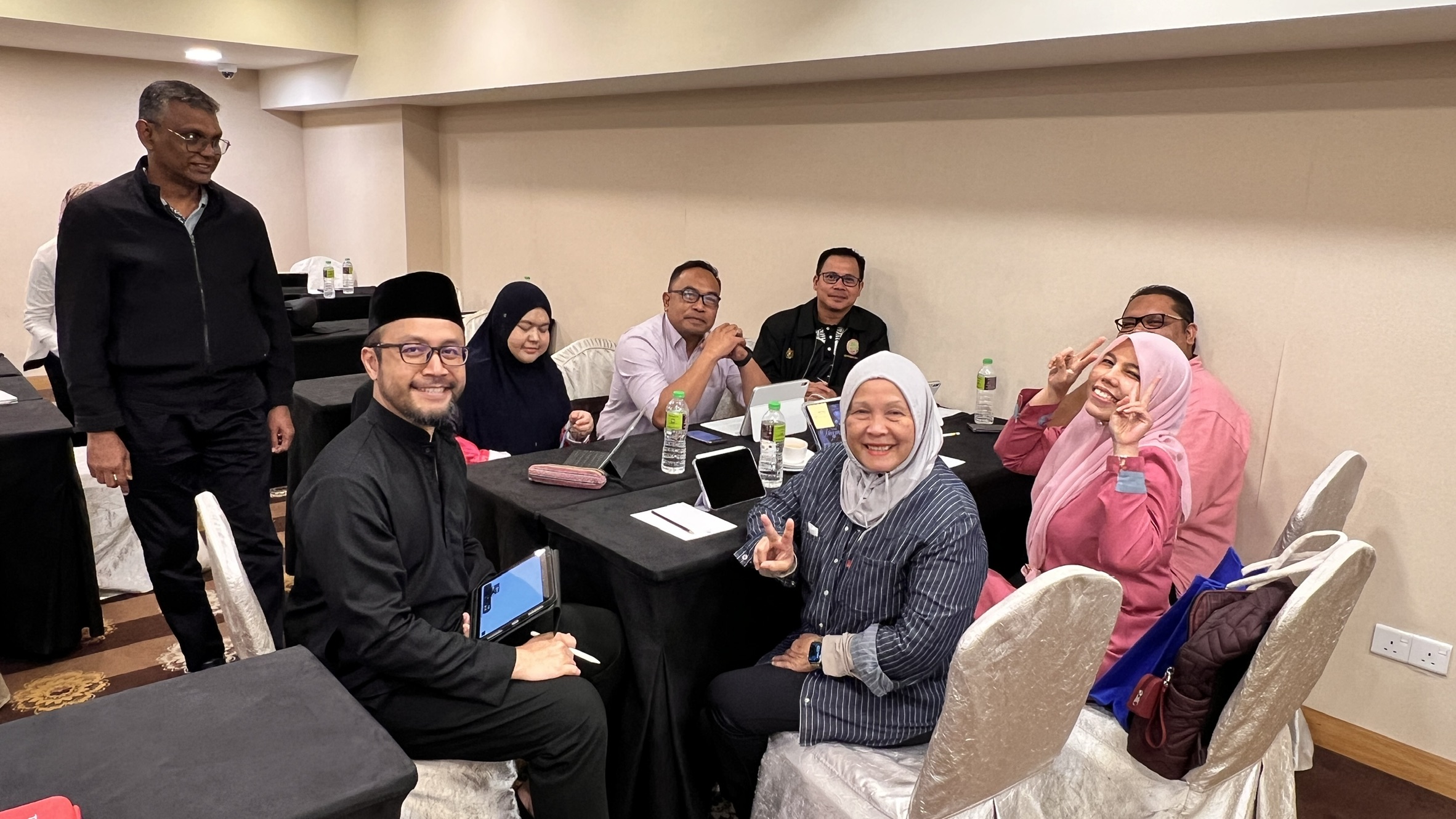Group photo with participants at the Institut Aminuddin Baki symposium