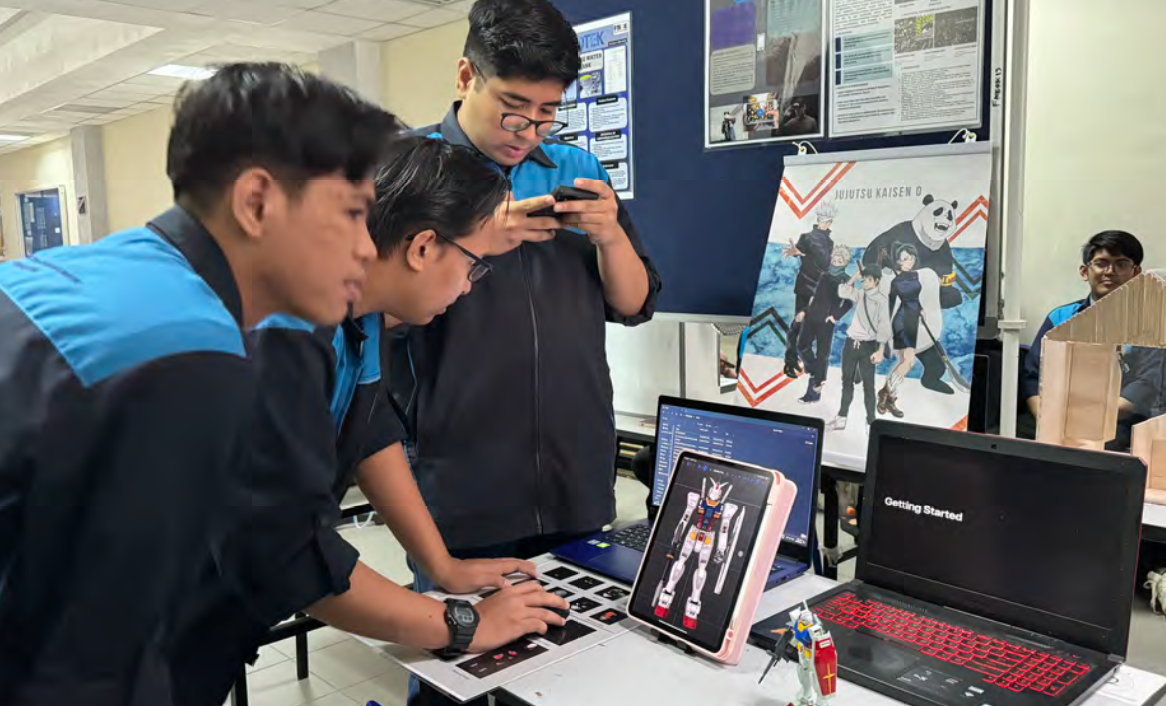 Students working on an Integrated Design Project prototype